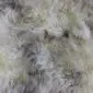 Rare-Breed British Sheepskin Quad RB4S-182 (6) Close-up of a rare breed sheepskin rug with long, thick wool in mottled shades of cream, grey, and brown.