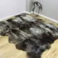 Rare-Breed Sheepskin Rug 6 Skin RBS6S-76 (3) Large six-skin rare breed sheepskin rug with natural grey, brown, and cream mottled wool on a wooden floor.