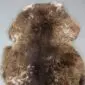 Rare Breed Sheepskin Rug RBL-103 (3) Large rare breed sheepskin rug with thick, textured wool in mottled shades of brown, tan, and cream.