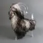 Long-haired Icelandic sheepskin rug in natural grey and white tones laid flat.