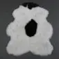 Icelandic Sheepskin Rug IMX132 (3) Shorn Icelandic sheepskin rug in cream with a large central black spot and irregular natural edges.