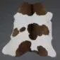 Calfskin Rug CF168a (2) Natural calf skin rug with white base and irregular dark brown patches.