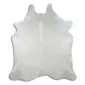 Natural champagne-coloured cowhide rug with an irregular organic shape and short hair texture.