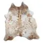 Natural cowhide rug with an irregular shape featuring beige and white speckled patterns on a white background.
