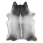 Natural cowhide rug with a grey and white salt and pepper speckled pattern and organic shape.