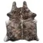 Natural shaped cowhide rug with exotic beige, brown, and grey speckled brindle patterns.