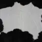 Cowhide Rug C01017 (2) Natural cowhide rug with a white centre and black irregular borders.