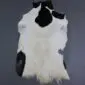 Goatskin Rug G1024 (6) Natural goatskin rug with white fur and large black patches, featuring an irregular organic shape.