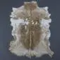 Goatskin Rug G1073 (2) Natural goatskin rug with mottled brown, grey and white markings in a traditional hide shape.