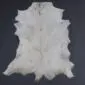 Goatskin Rug G1081 (2) Natural goatskin rug with white and light grey fur in an irregular hide shape.