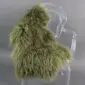 Khaki Mongolian lambskin rug with long, curly wool laid flat.