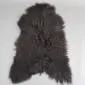 ICL-CURLY Blacky Brown (2) Natural dark brown Icelandic sheepskin rug with a thick, curly wool texture and irregular organic shape.