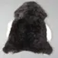 Icelandic Sheepskin Rug IMX137 (2) Shorn Icelandic sheepskin rug with thick, dark brown curly wool and a natural hide shape.