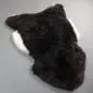 Icelandic Sheepskin Rug IMX137 (4) Shorn Icelandic sheepskin rug with thick black wool and white edges in a natural pelt shape.