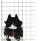 Natural cowhide rug with black, white, and dark brown patches, shown on a measuring grid.