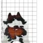 Natural cowhide rug with an irregular shape featuring white, dark brown, and tan speckled patterns.
