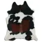 Natural cowhide rug with an irregular shape featuring black, dark brown, and white speckled patches.