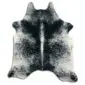 Natural cowhide rug with a grey and white speckled salt and pepper pattern and organic shape.