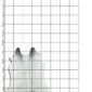 Natural grey cowhide rug with dark charcoal markings on a white grid background.
