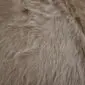 Cowhide Rug C01056 (1) Close-up of a beige cowhide rug showing natural hair texture and subtle colour variations.