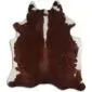 Natural cowhide rug with dark brown centre and white speckled edges.