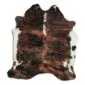 Cowhide Rug C01058 a (2) Natural cowhide rug with dark brown and black brindle patterns and white edges.