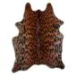 Natural shaped cowhide rug with a brown and black jaguar rosette print.