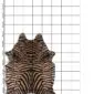 Natural cowhide rug with a brown and black zebra print pattern, shown on a white grid background.