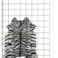 Natural cowhide rug with a black and white tiger print pattern, shown on a measuring grid.