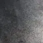 Close up of a grey cowhide rug showing the natural hair texture and tonal variations.