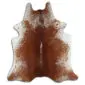 Natural cowhide rug with brown and white speckled patterns and an irregular shape.