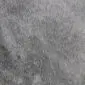 Close-up of a grey cowhide rug showing the natural hair texture and tonal variations.