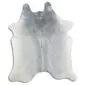 Natural cowhide rug in light grey and white with an irregular organic shape.