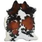 Cowhide Rug C01109 a (2) Natural cowhide rug with a white base and large, irregular dark brown and black patches.