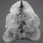 Icelandic Natural Grey Shorn Sheepskin Rug INGSS-90 (1) Natural grey shorn Icelandic sheepskin rug with a dark central stripe and thick wool texture.