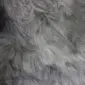 Icelandic Natural Grey Shorn Sheepskin Rug INGSS-90 (5) Close-up of shorn natural grey Icelandic sheepskin rug showing dense, wavy wool fibres in variegated grey tones.