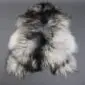 Long-haired Icelandic sheepskin rug with natural grey, white and black markings.