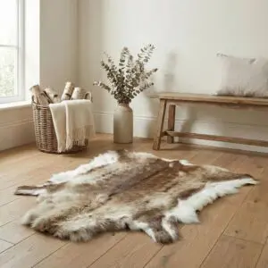 Natural reindeer hide rug showing classic balanced mix of brown grey and cream tones