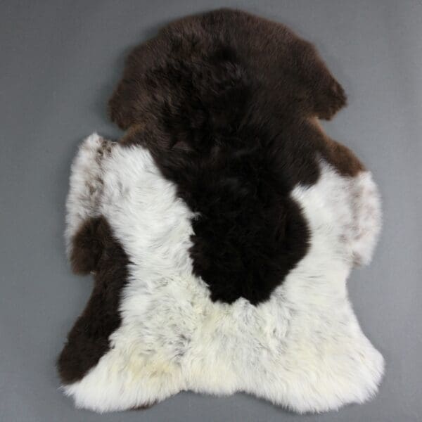 Why does my new sheepskin rug smell? Hide Rugs